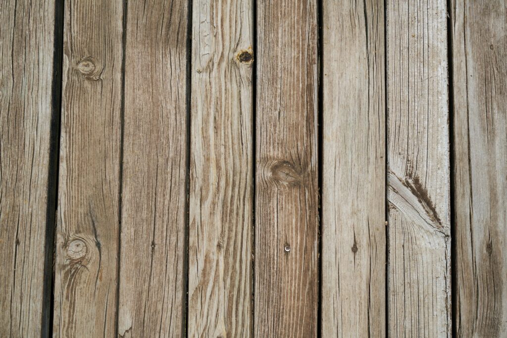 A close-up view of rustic wooden planks showcasing natural wood texture and grain.