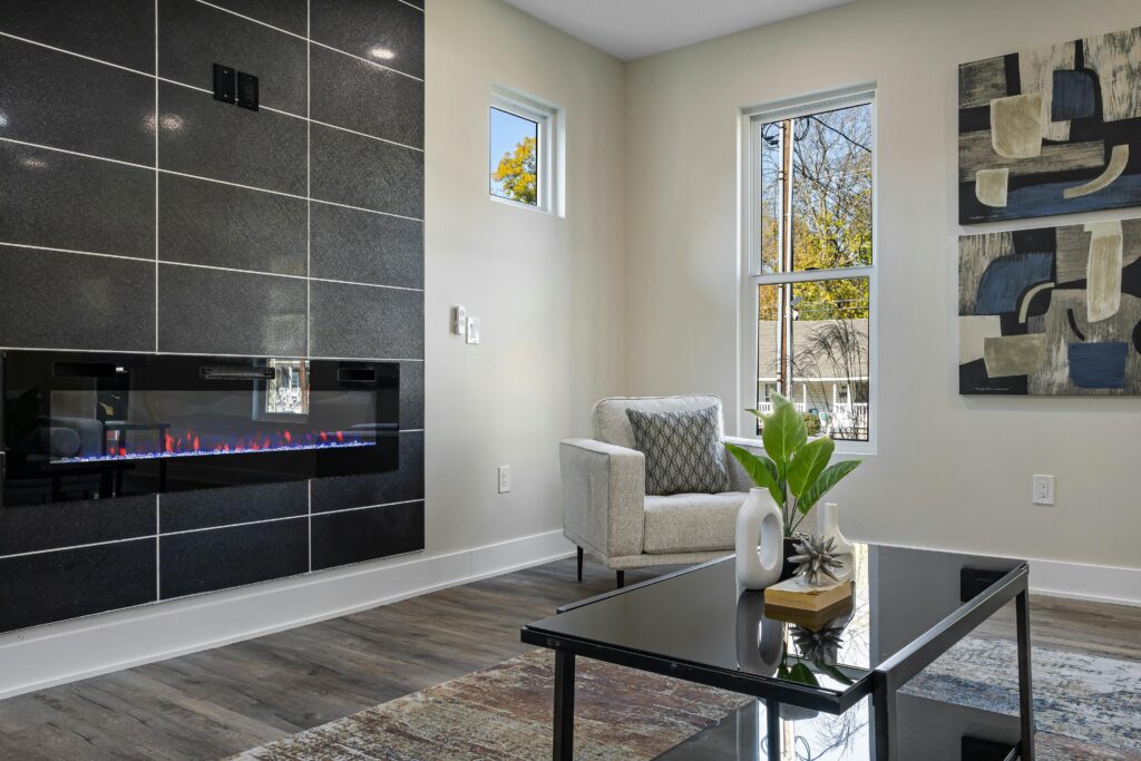 Stylish living room interior with fireplace and contemporary decor.
